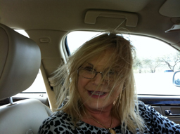 Sher in her 2008 Cadillac DTS near home.  March 2012